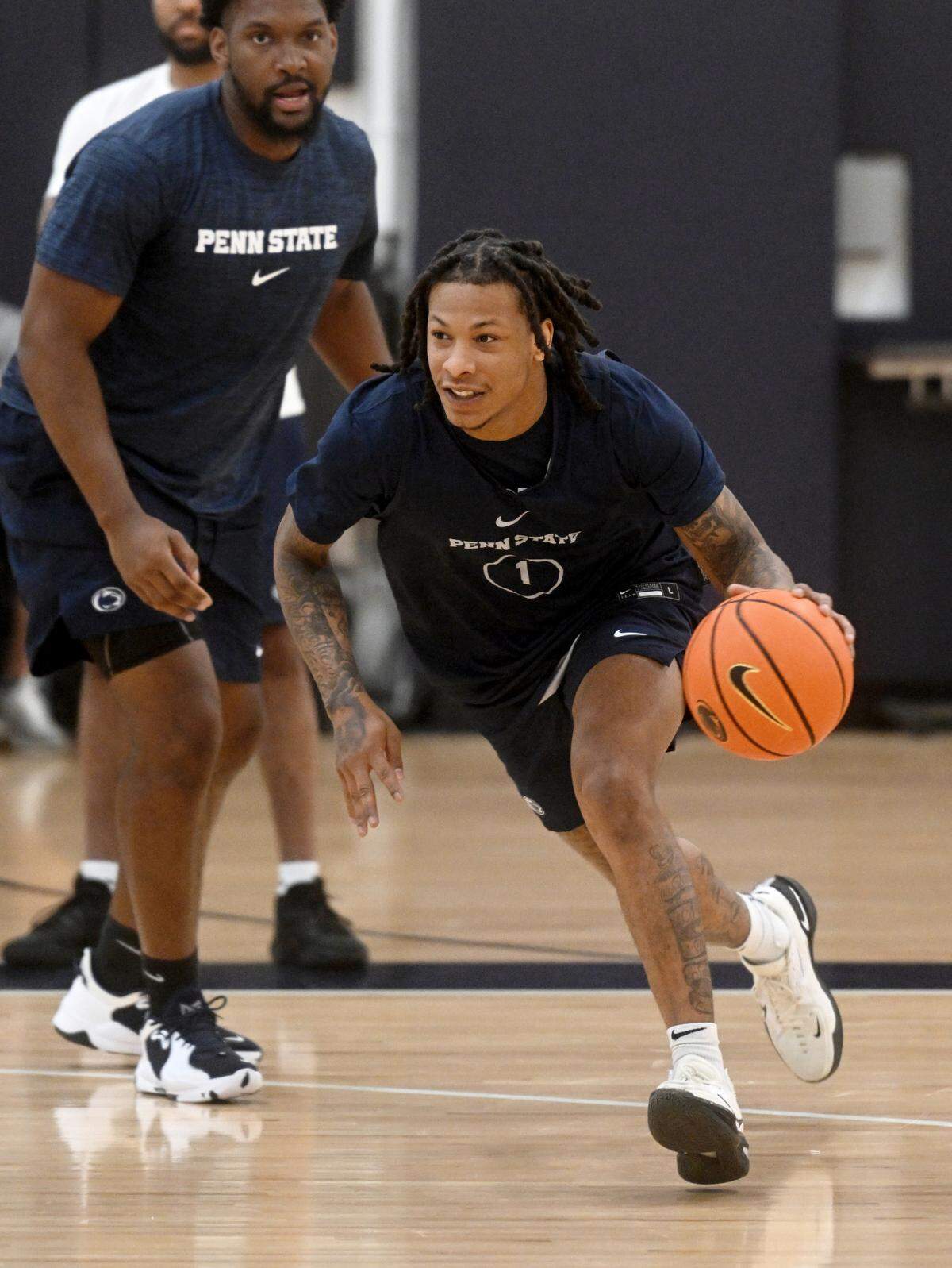 Penn State’s Ace Baldwin Jr. dribbles down the court with the ball during a men’s basketball summer workout on Tuesday, July 11, 2023.