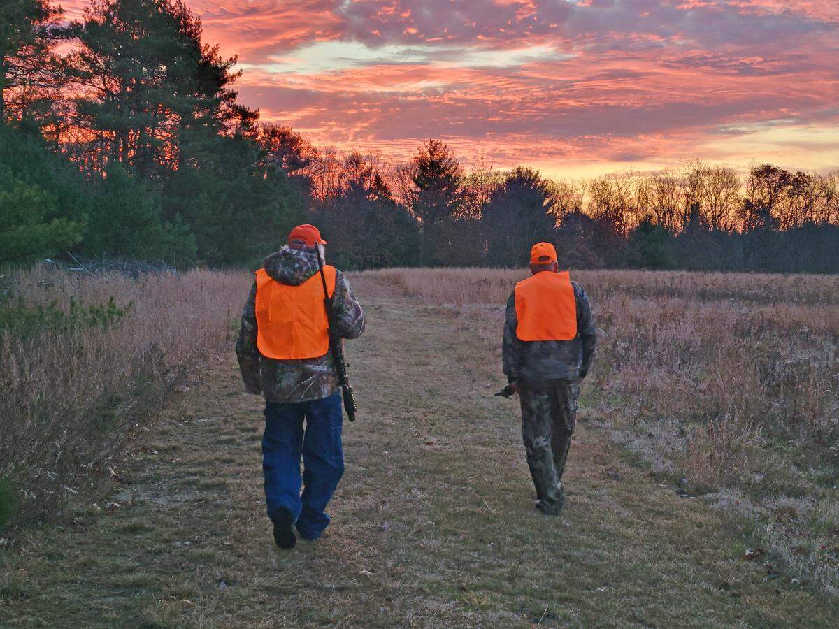 Hunters walk toward a beautiful sunrise. Additional Sundays are expected to be added to this fall’s hunting  seasons.