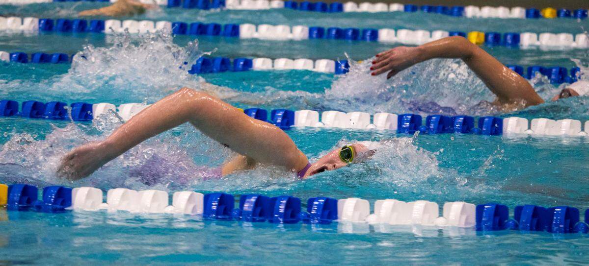 State College High School senior Kate Doucette turns to her right side for air during the Girl’s 500 Yard Freestyle in the AAA Bracket during the PIAA Swimming and Diving 2023 District 6 Championship held at the McCoy Natatorium on Saturday, Mar. 4, 2023, in University Park, Pa. Doucette placed first in her event with a final time of 5:19.09.