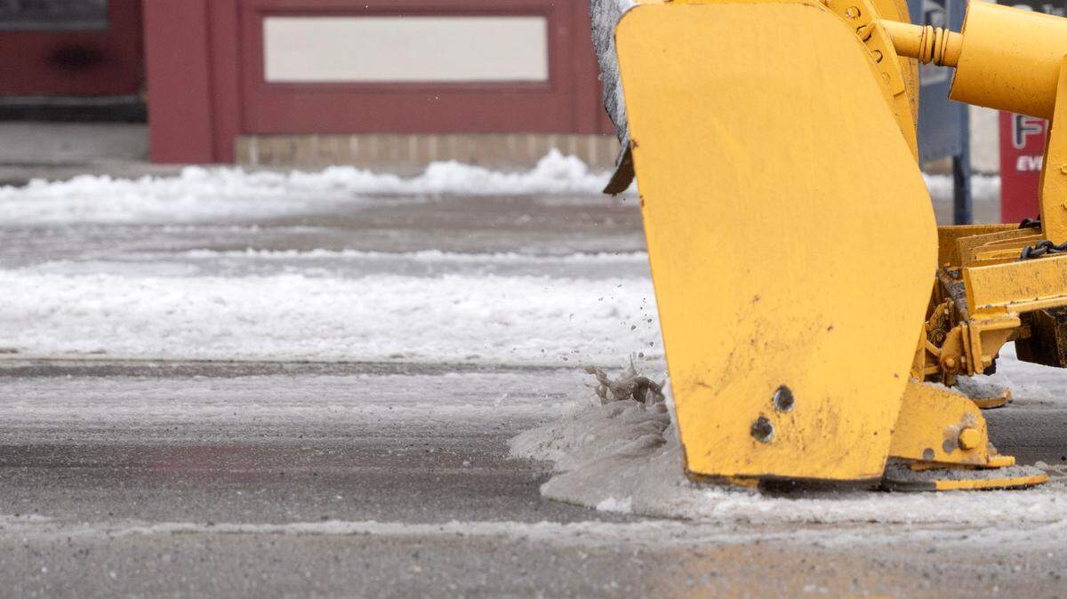A PennDOT truck clears South Allegheny Street in Bellefonte after a winter mix on Thursday, Feb. 6, 2025.
