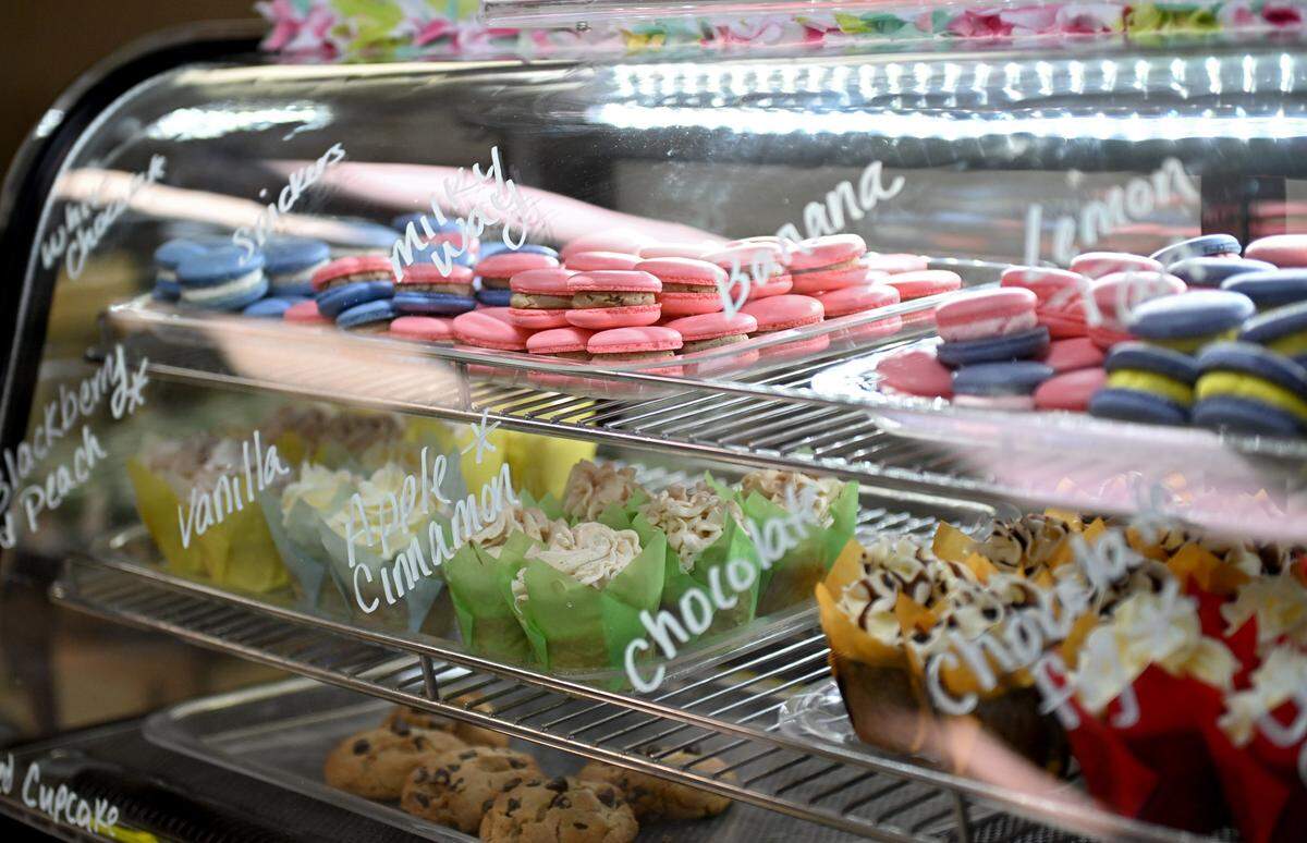 The display case full of cupcakes, macarons and cookies from Elizabeth Henry’s on Monday, Jan. 12, 2026. Macaron flavors rotate each week with this week including banana, Milky Way, white chocolate and more.