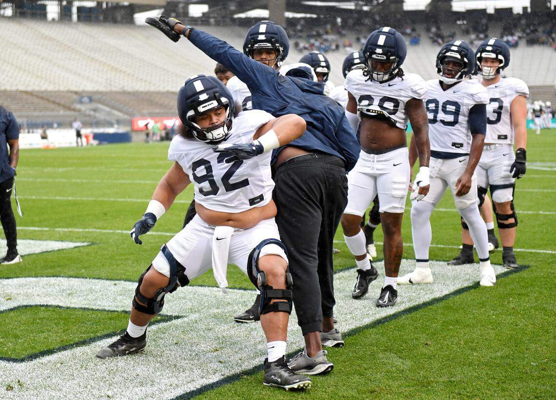 Penn State defensive tackle Siale Taupaki runs a drill during Blue-White Practice on Saturday, April 25, 2026.  