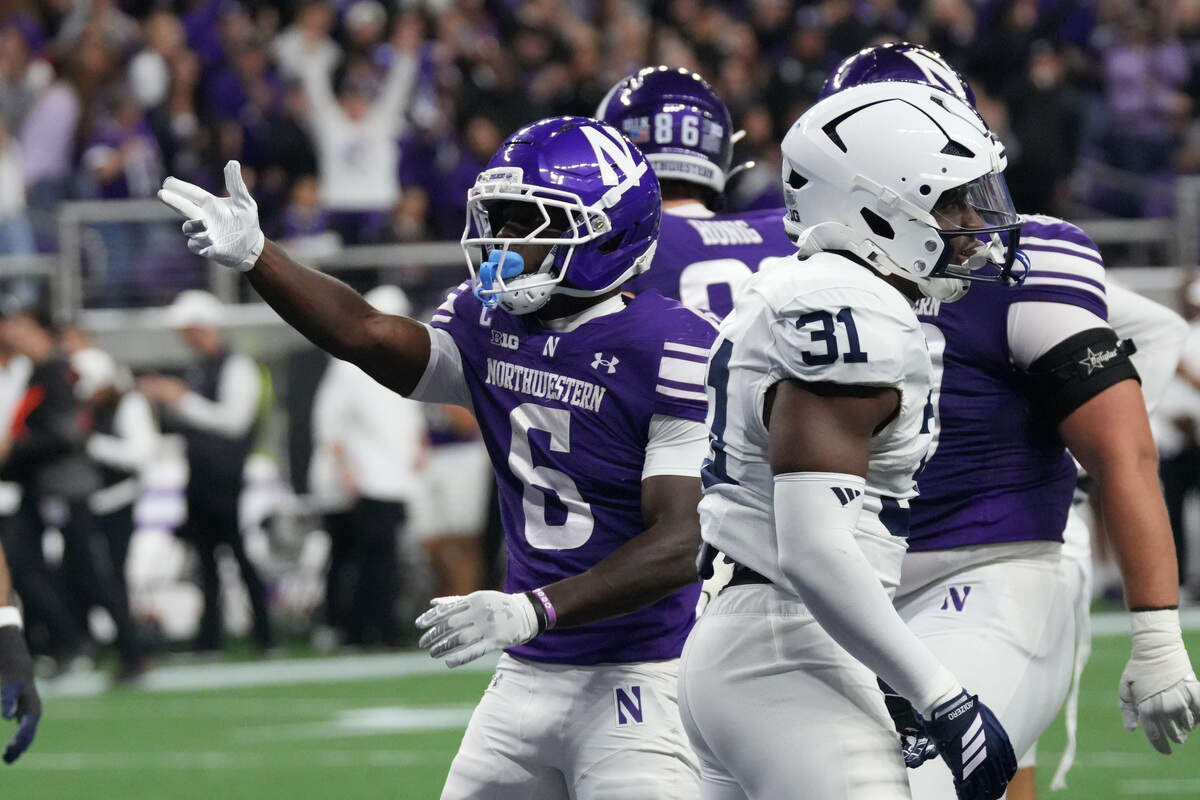 Northwestern running back Joseph Himon II (6) gestures after getting a first down against Penn State during the first quarter at the new Ryan Field on Friday, Oct. 2, 2026, in Evanston, Ill.
