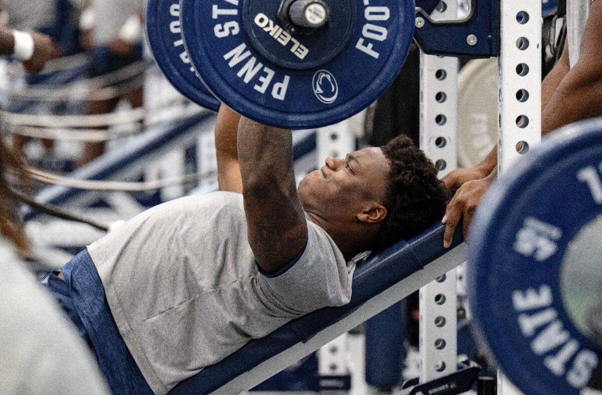 Penn State defensive end Jaylen Harvey bench presses during a summer strength session on Monday, July 14, 2025 in the Lasch Building.