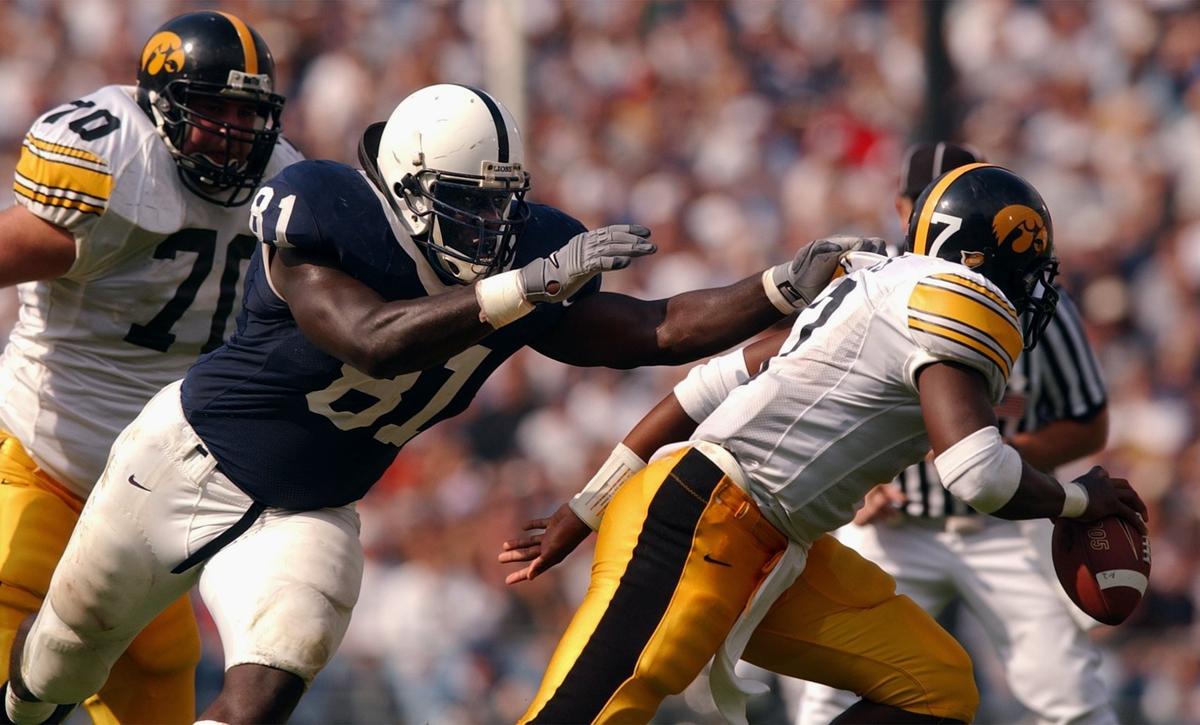 Penn State’s Michael Haynes (81) chases down Iowa quarterback Brad Banks (7) in 2002. (Centre Daily Times-Craig Houtz)