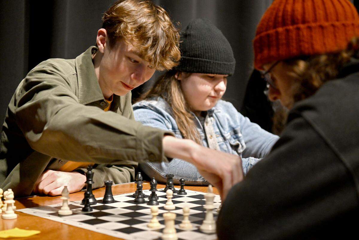 Willem Hathaway makes a move in his match against Josey Kassab during the State College Area School District chess tournament on Tuesday, Feb. 20, 2024.