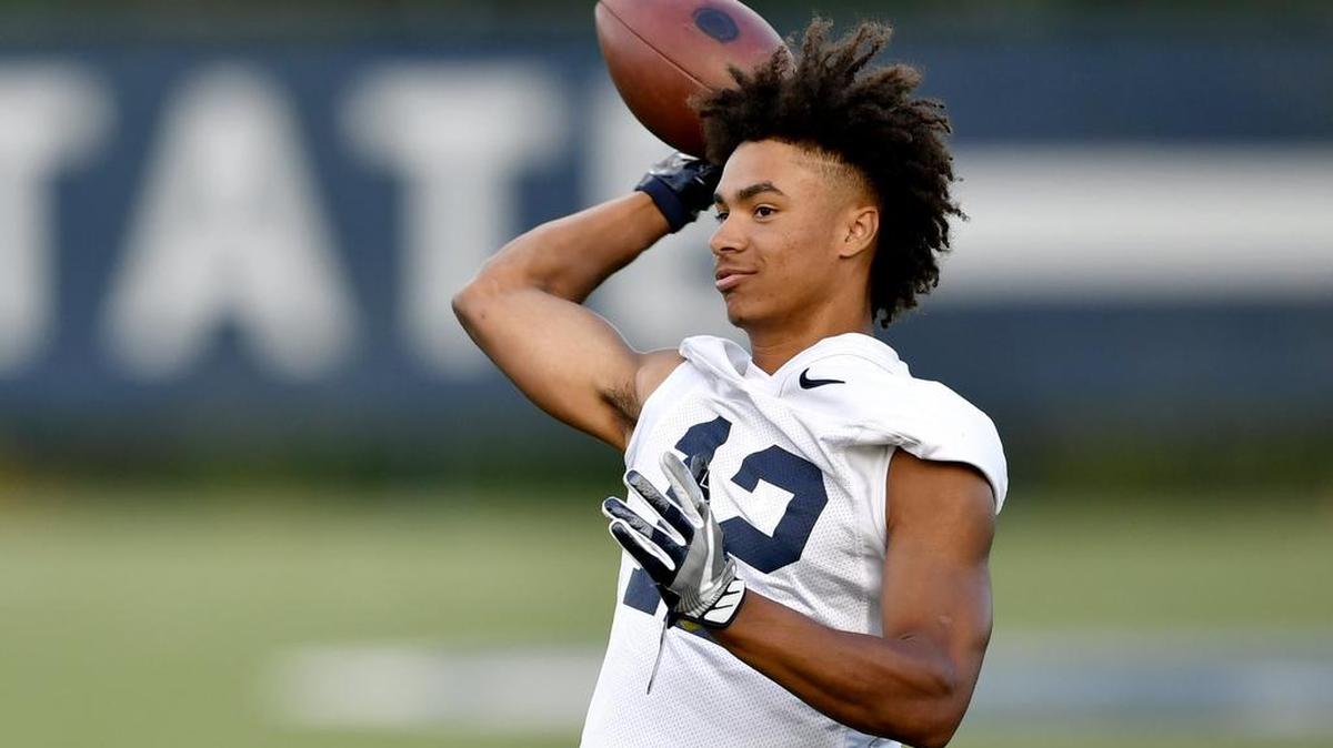 Penn State wide receiver Mac Hippenhammer tosses the ball around with teammates after Penn State football practice on Wednesday, August 23, 2017.