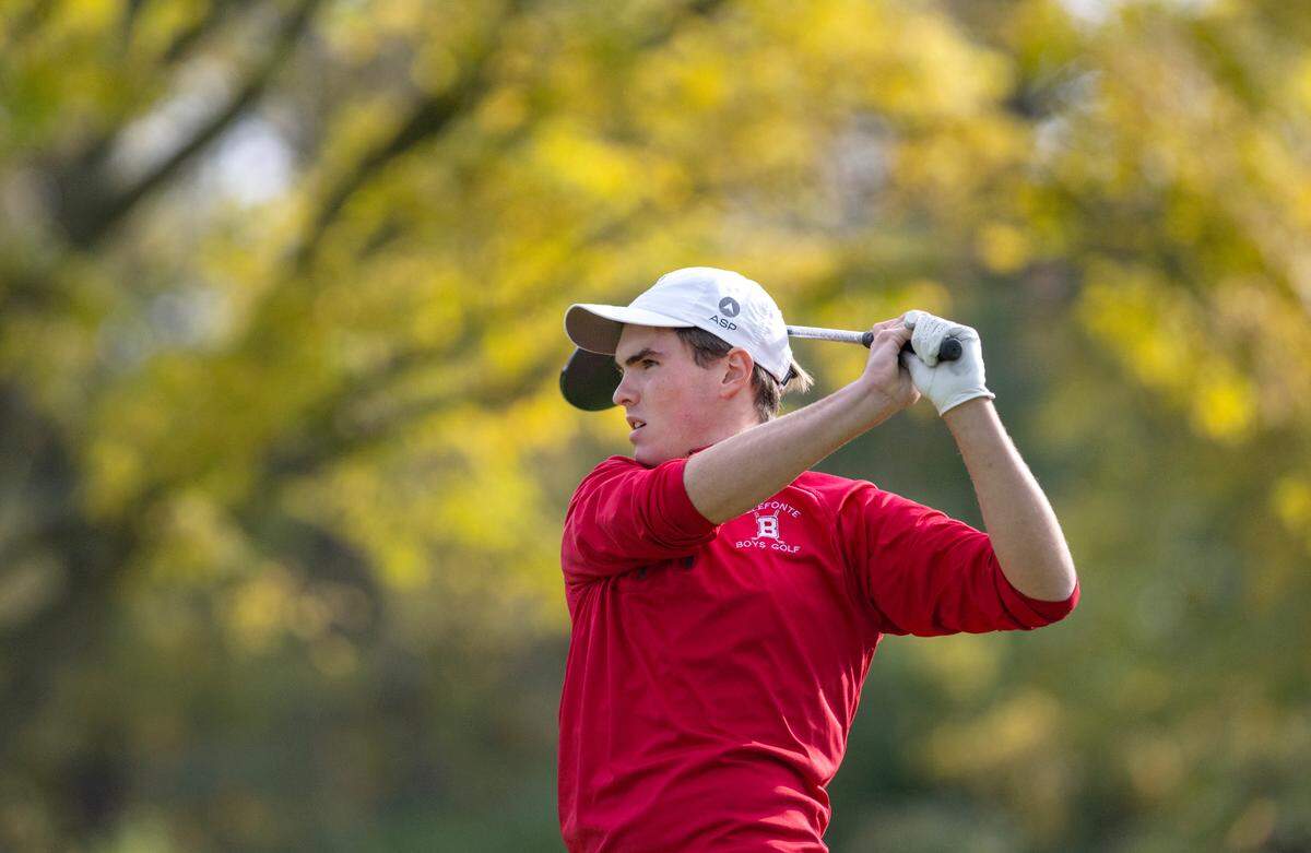Bellefonte’s Davis Corman watches his tee shot during the PIAA golf championships on Monday, Oct. 17, at the Penn State Golf Courses.