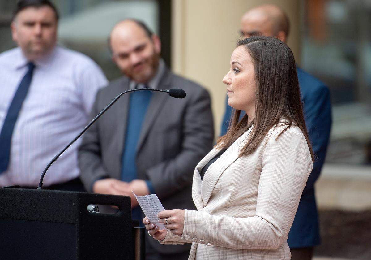 Krista Henry talks about the Pardon Project of Centre County during a press conference on Friday.