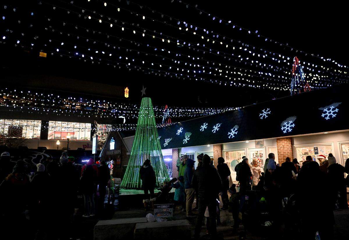 Families visit Santa, make crafts and listen to holiday music at Fraser Street’s MLK Plaza during the Downtown State College Light Up Night on Nov. 17.