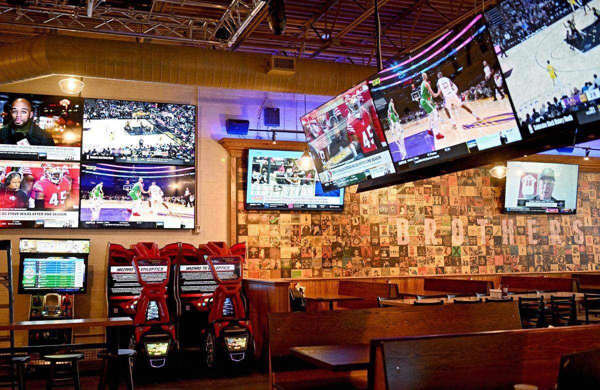 Games and TVs at Brothers Bar & Grill on Allen Street in downtown State College on Thursday, Feb. 15, 2024.