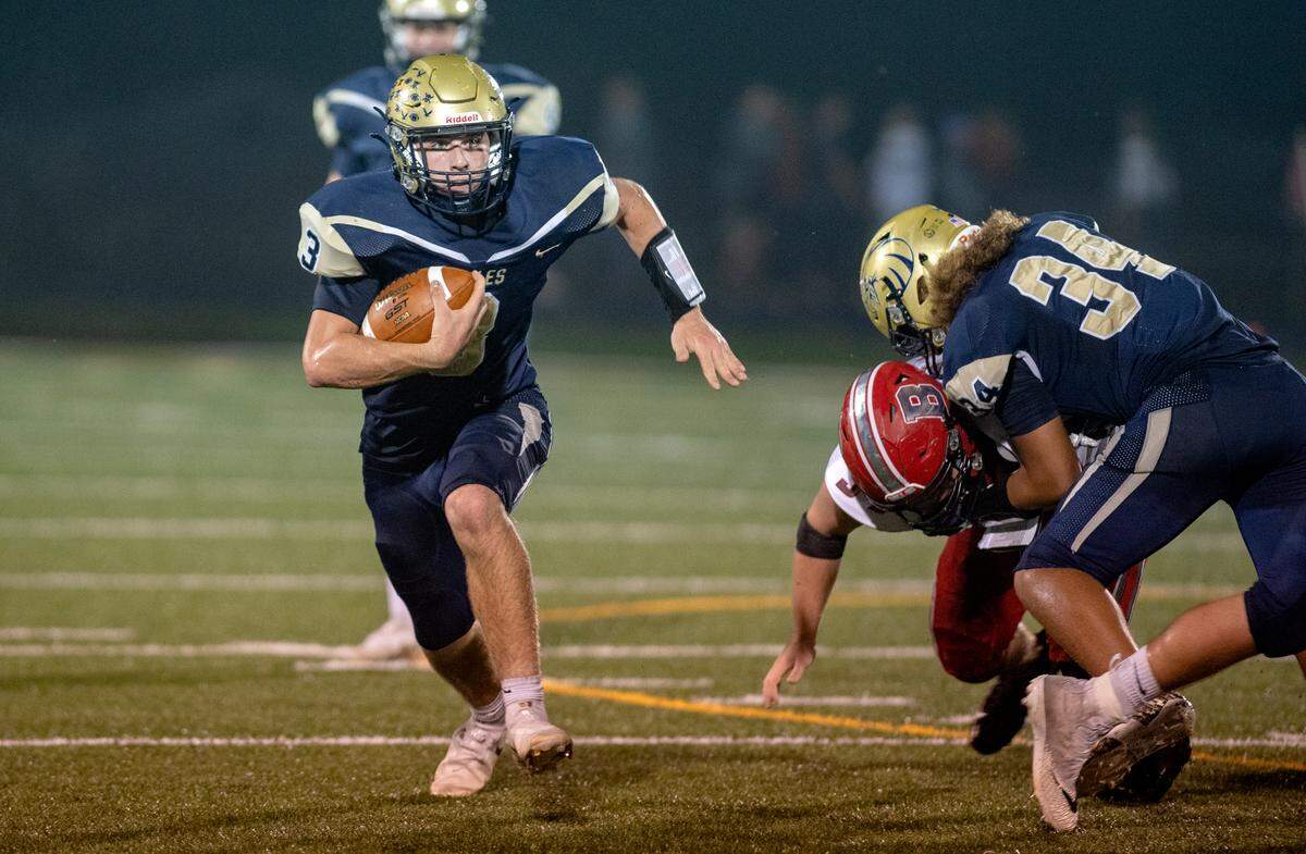 Bald Eagle Area’s Garrett Burns cuts down the field with the ball during the game against Bellefonte on Friday, Oct. 15, 2021.