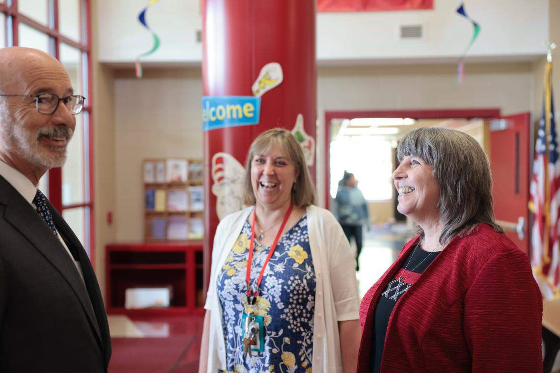 Pennsylvania Gov. Tom Wolf talks with Bellefonte Area School District superintendent Tammie Burnaford during a visit to Marion-Walker Elementary School on Wednesday.