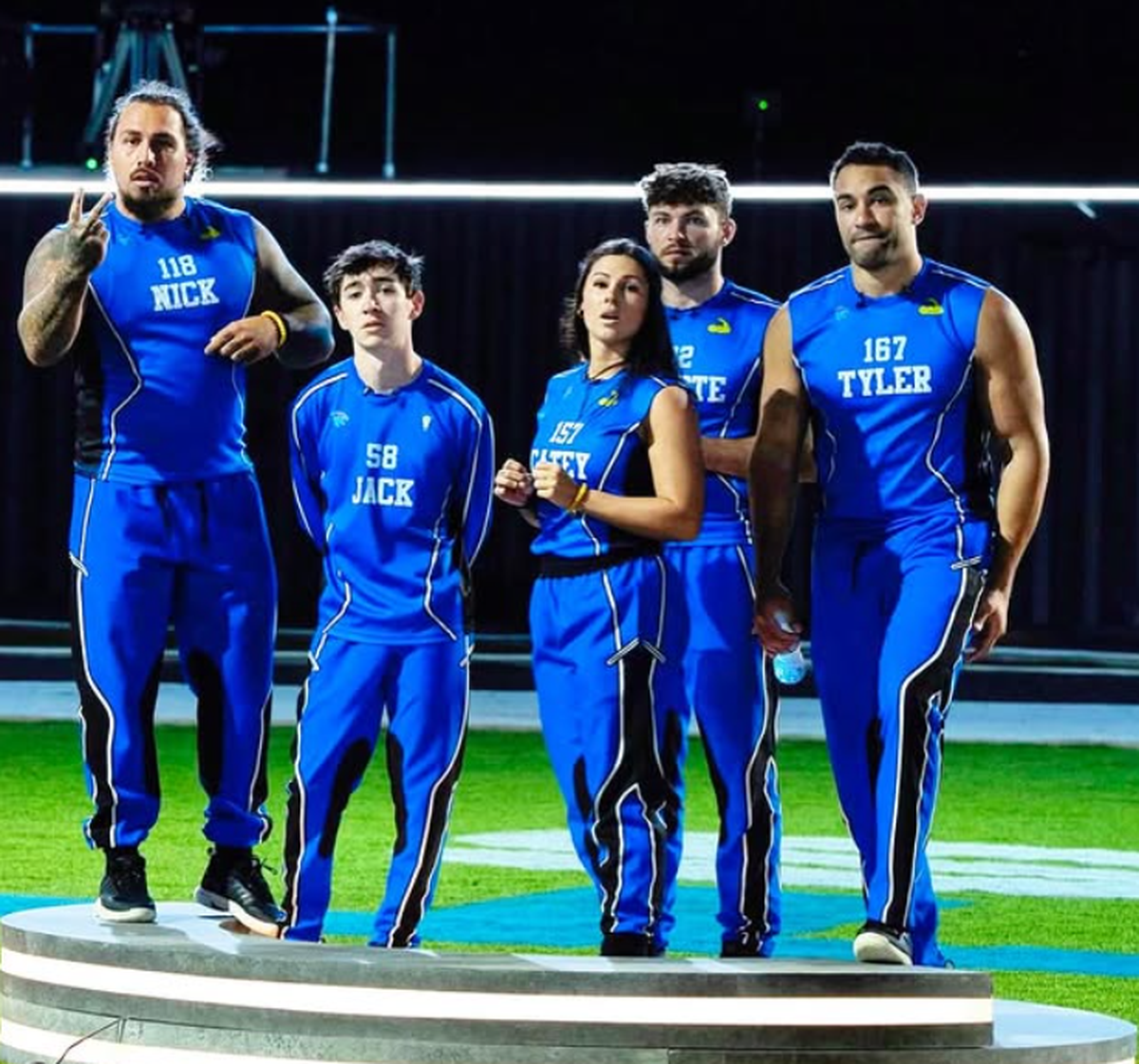 Bellefonte native, former Penn State wide receiver and U.S. Air Force Pilot Tyler Lucas, far right, stands alongside his “Team Strong” teammates during the second season of “Beast Games.”