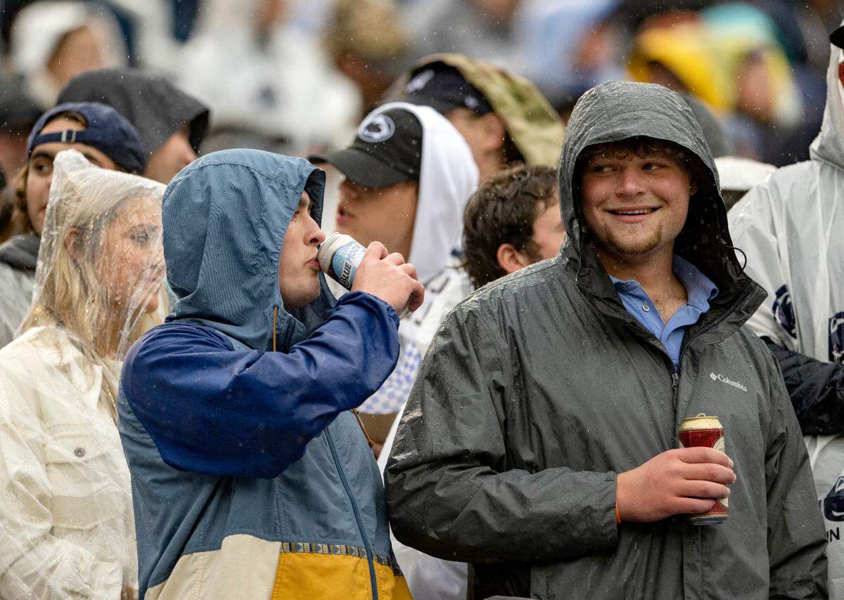 Fans enjoy beers at Beaver Stadium during the Penn State football game against Northwestern on Saturday, Oct. 1, 2022.