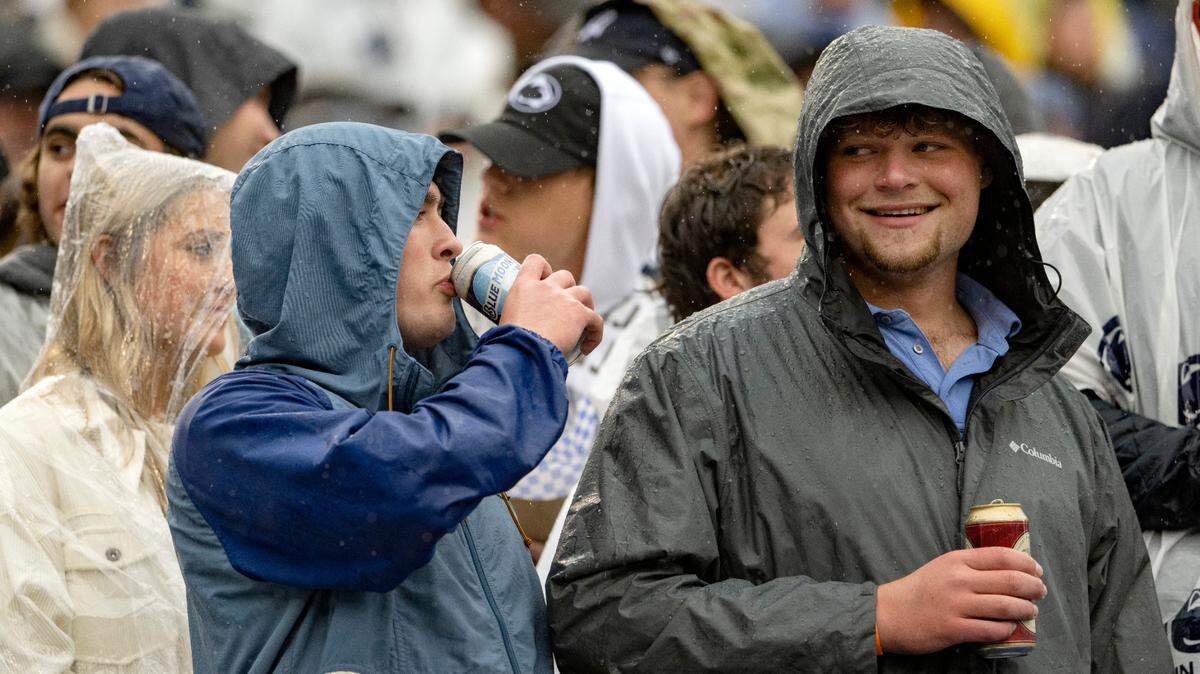 Fans enjoy beers at Beaver Stadium during the Penn State football game against Northwestern on Saturday, Oct. 1, 2022.