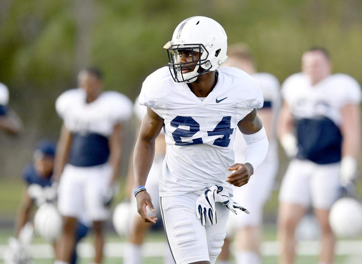 Penn State cornerback Amani Oruwariye gets ready for a play at practice on Sunday, Dec. 30, 2018 at Celebration High School. For the last practice of the season players traded jerseys with a teammate.