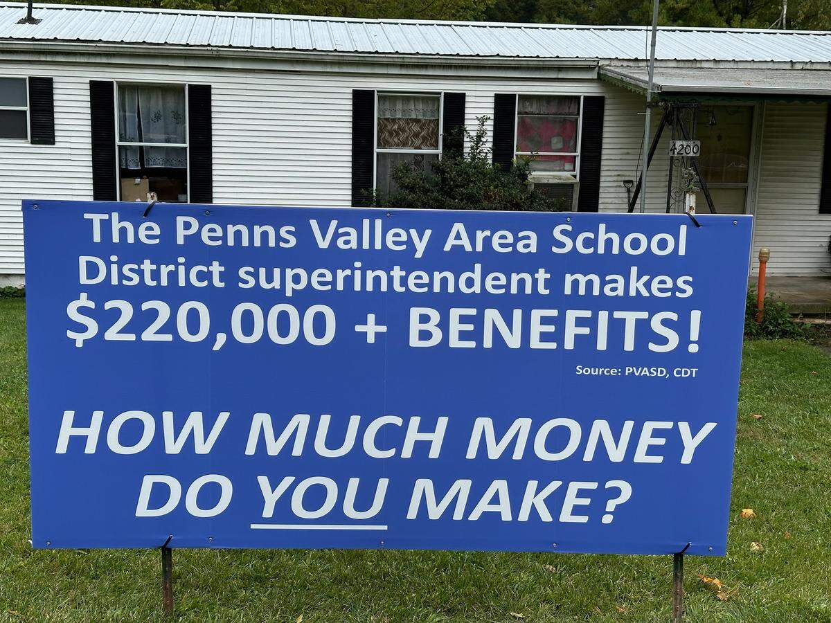 Signs from the Penns Valley Town Halls group were paid for by donations collected at a town hall meeting.