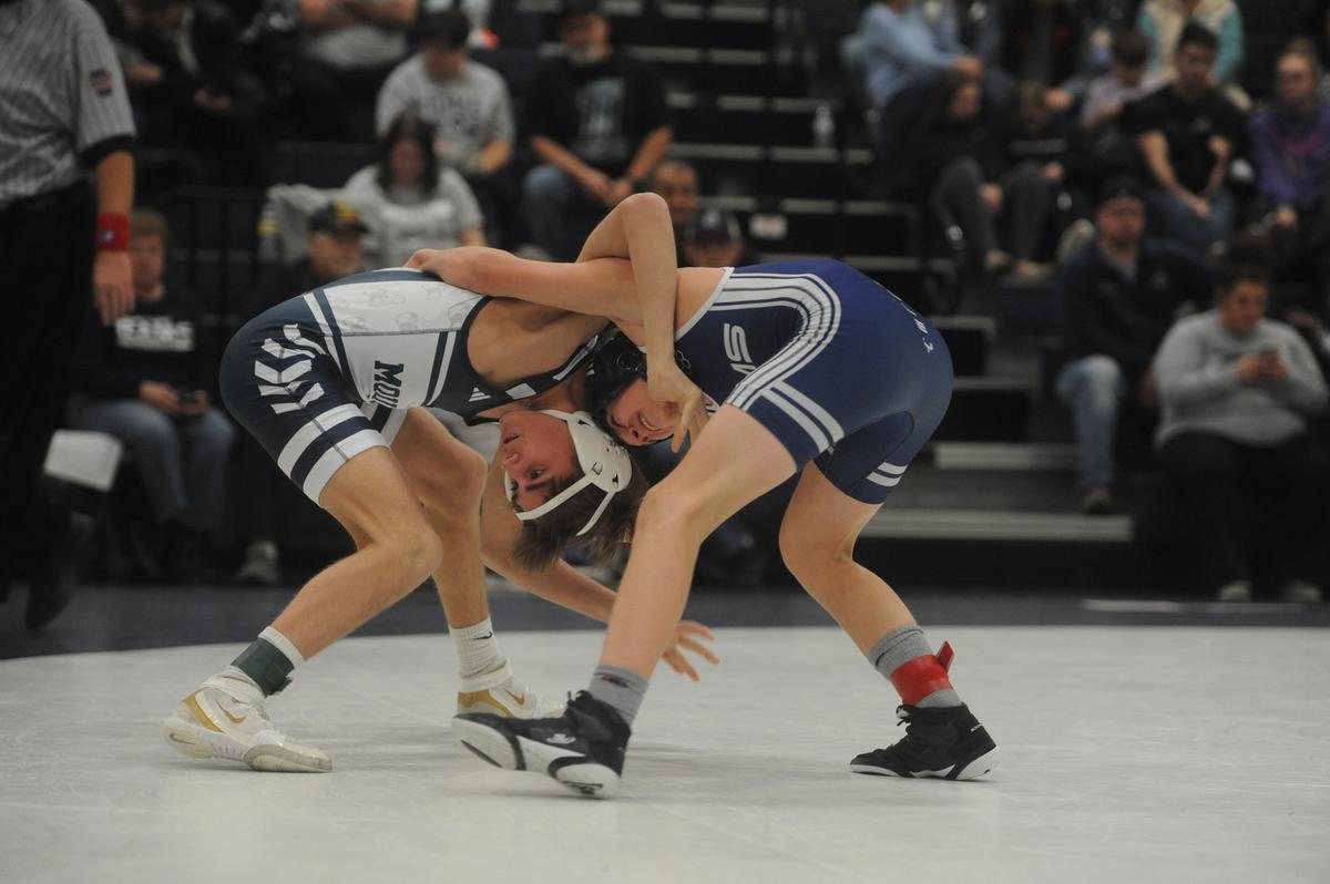 Philipsburg-Osceola’s Caleb Hummel, left, and Penns Valley’s Conner Myers look for a shot opportunity in their 107-pound match of the Mounties’ 51-14 loss on Tuesday, January 17, 2023. Hummel secured a 14-2 major decision.
