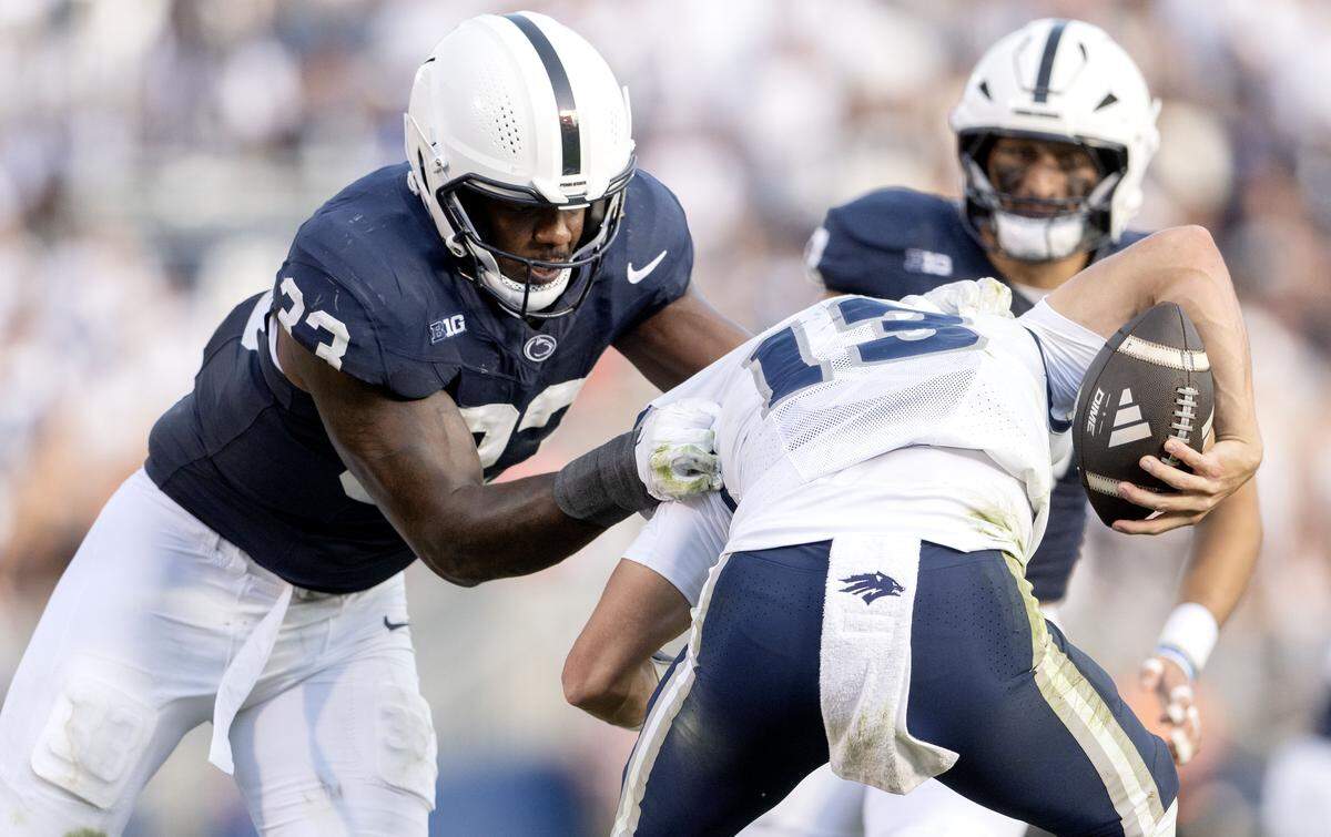 Penn state defensive end Dani Dennis-Sutton pressures Nevada quarterback Chubba Purdy during the game on Saturday, Aug. 30, 2025 at Beaver Stadium.