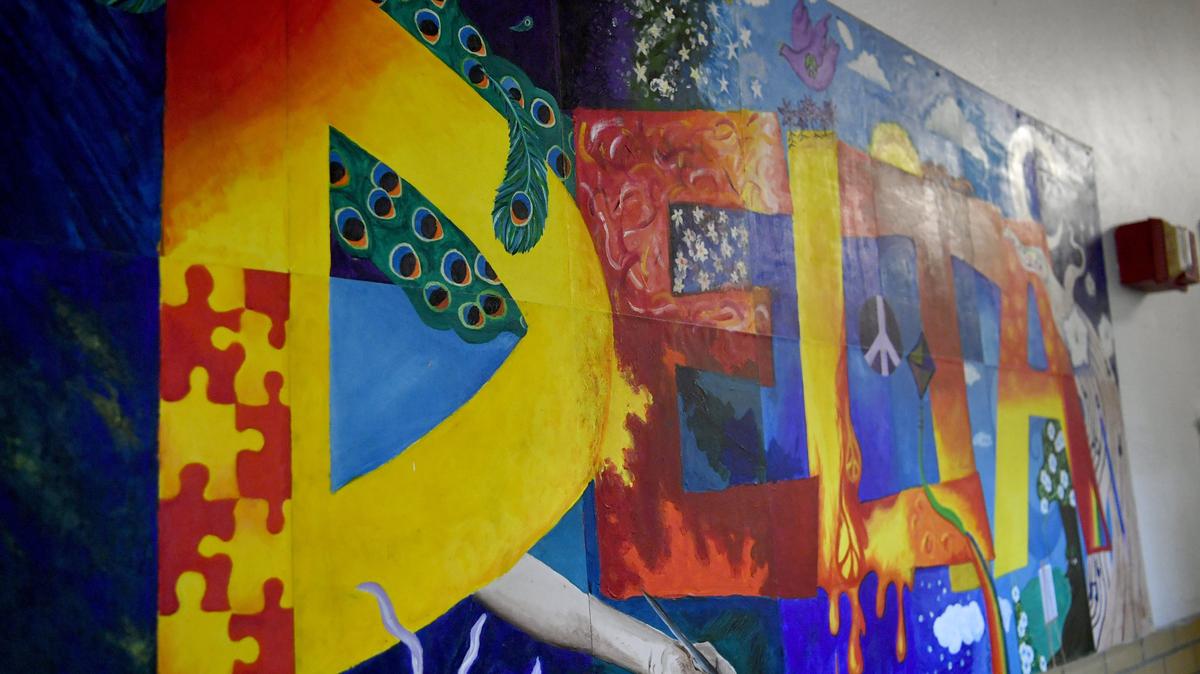 A mural at the Delta Program’s former home in the Fairmount Building is pictured in 2019. The State College Area School District is considering making the program its own school.