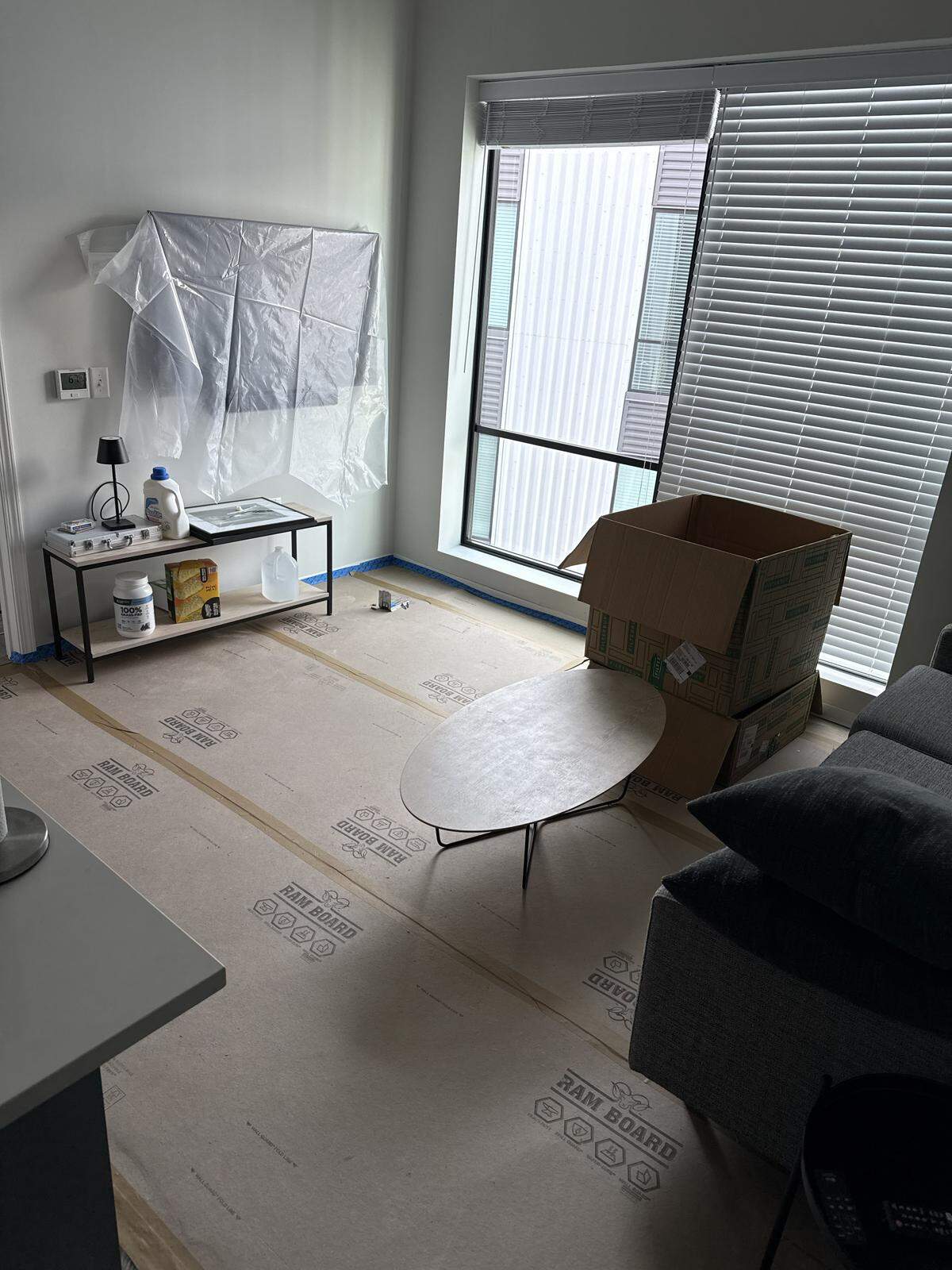 Ram Board can be seen in this apartment on the 12th floor of The Maxxen, an apartment complex in downtown State College, on March 25. This apartment was without a working kitchen or kitchen water for days in March while maintenance tried to dry the floors after a pipe burst and flooded apartments in early February. The residents were told the apartment was livable during this time. 