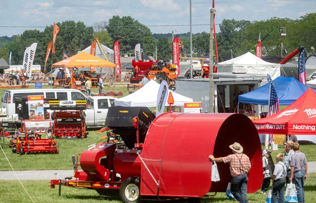 Visitors browse the vendors and exhibits at Penn State Ag Progress Days on Tuesday, August. 13, 2024.  