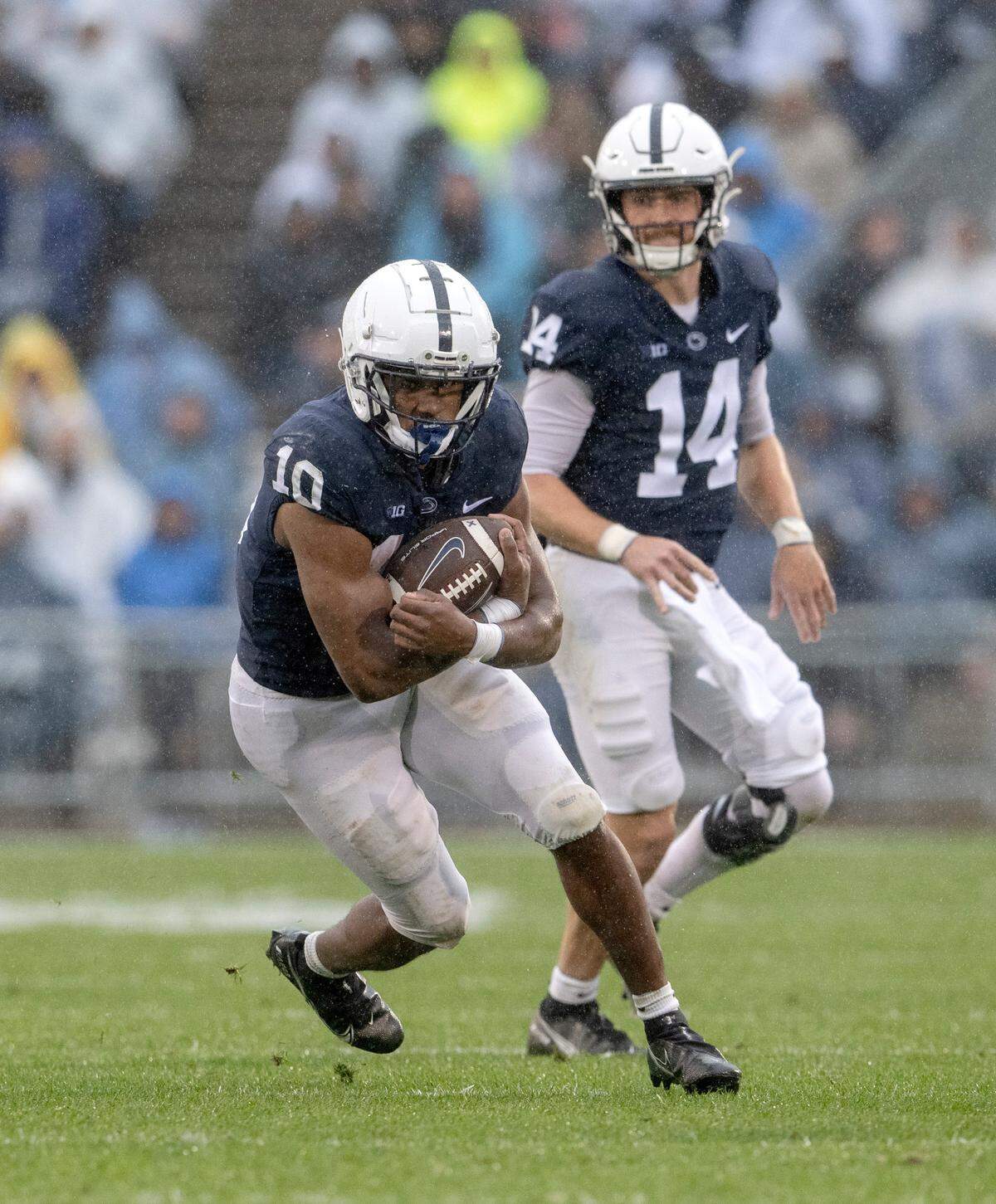 Penn State running back Nick Singleton gets the hand off from quarterback Sean Clifford during the game against Northwestern on Saturday, Oct. 1, 2022.