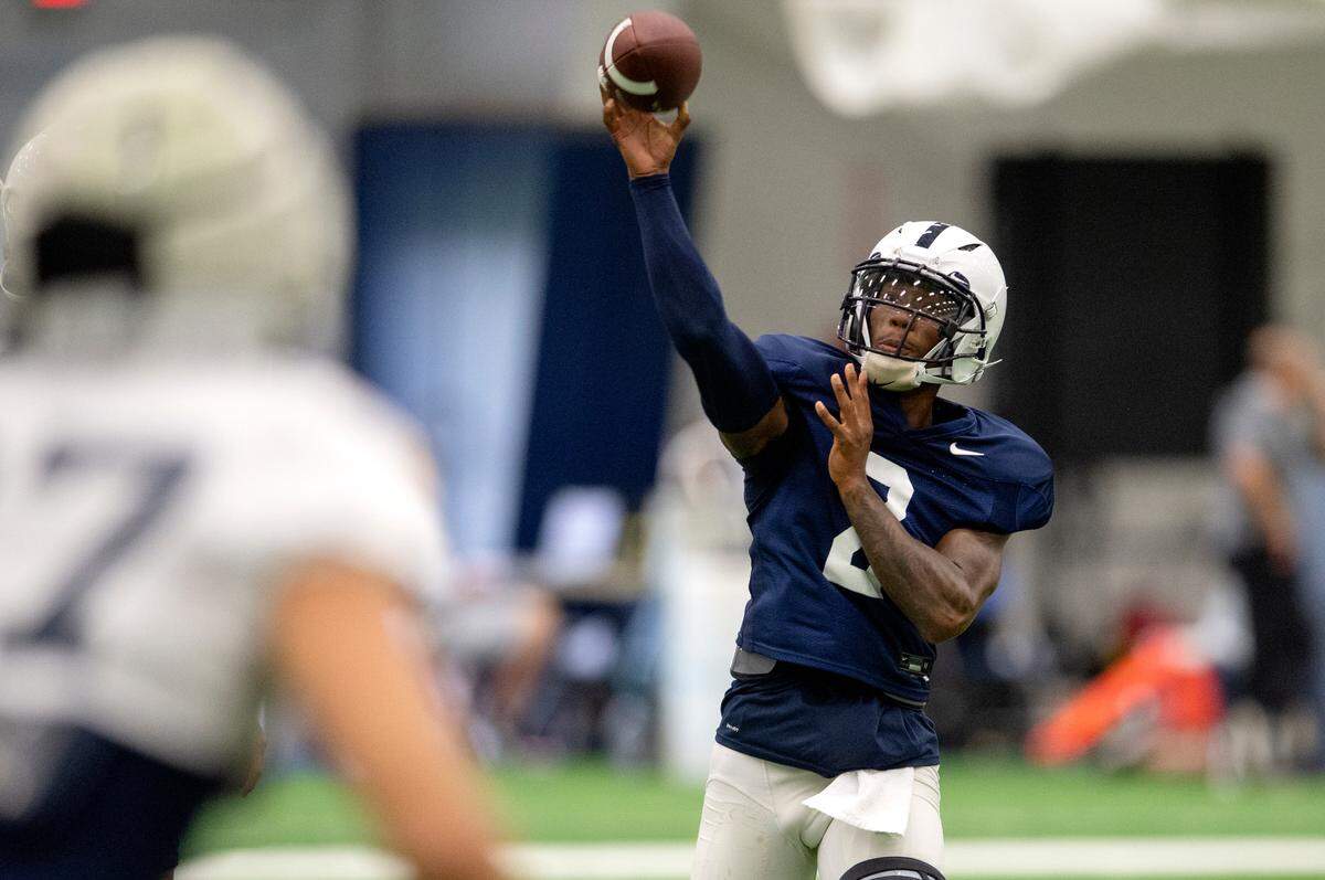 Penn State quarterback Ta’Quan Roberson makes a pass during practice on Wednesday, Sept. 1, 2021 in Holuba Hall.