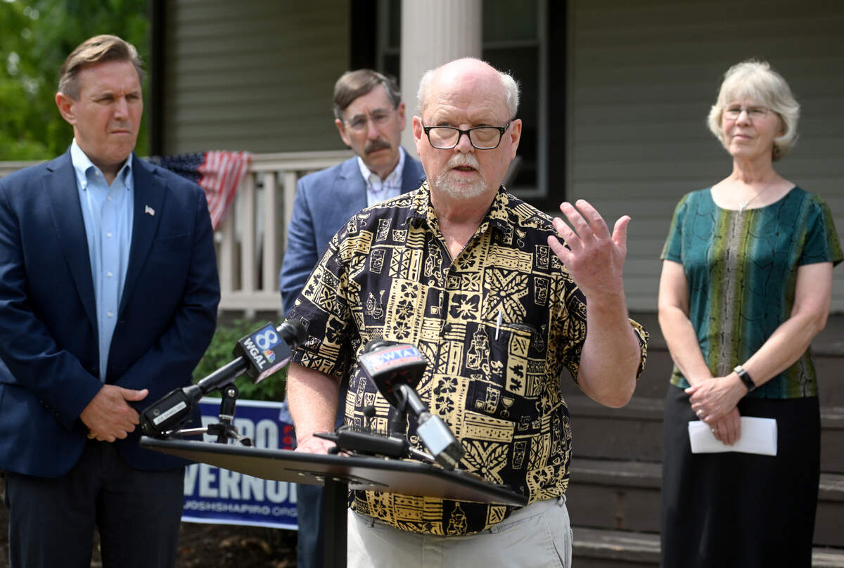 State College Borough Council president Jesse Barlow speaks against Doug Mastriano and his association with Gab during a gathering on Tuesday, Aug. 2, 2022.