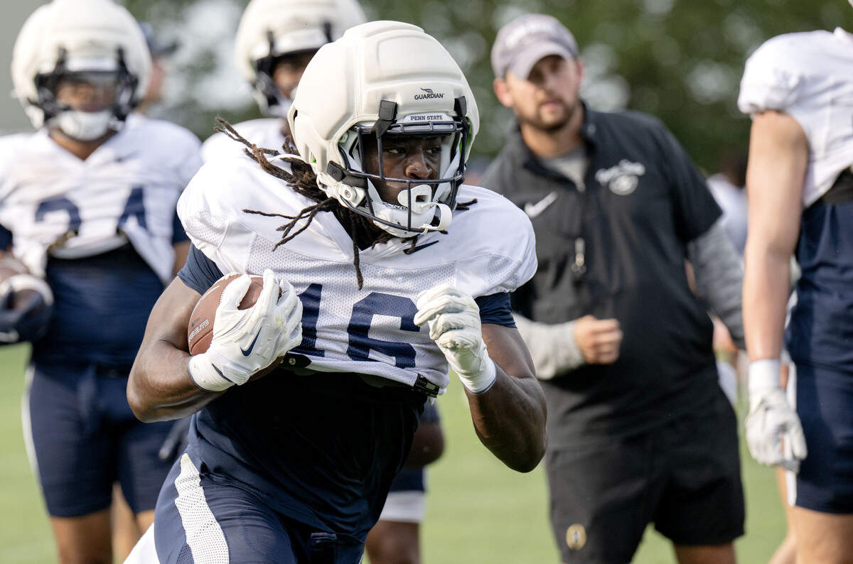 Penn State tight end Khalil Dinkins runs a drill during practice on Saturday, Aug. 2, 2025.