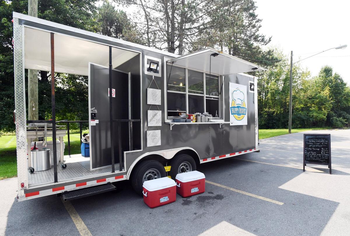 A view of the Happy Dishes food truck in August 2018 in State College.
