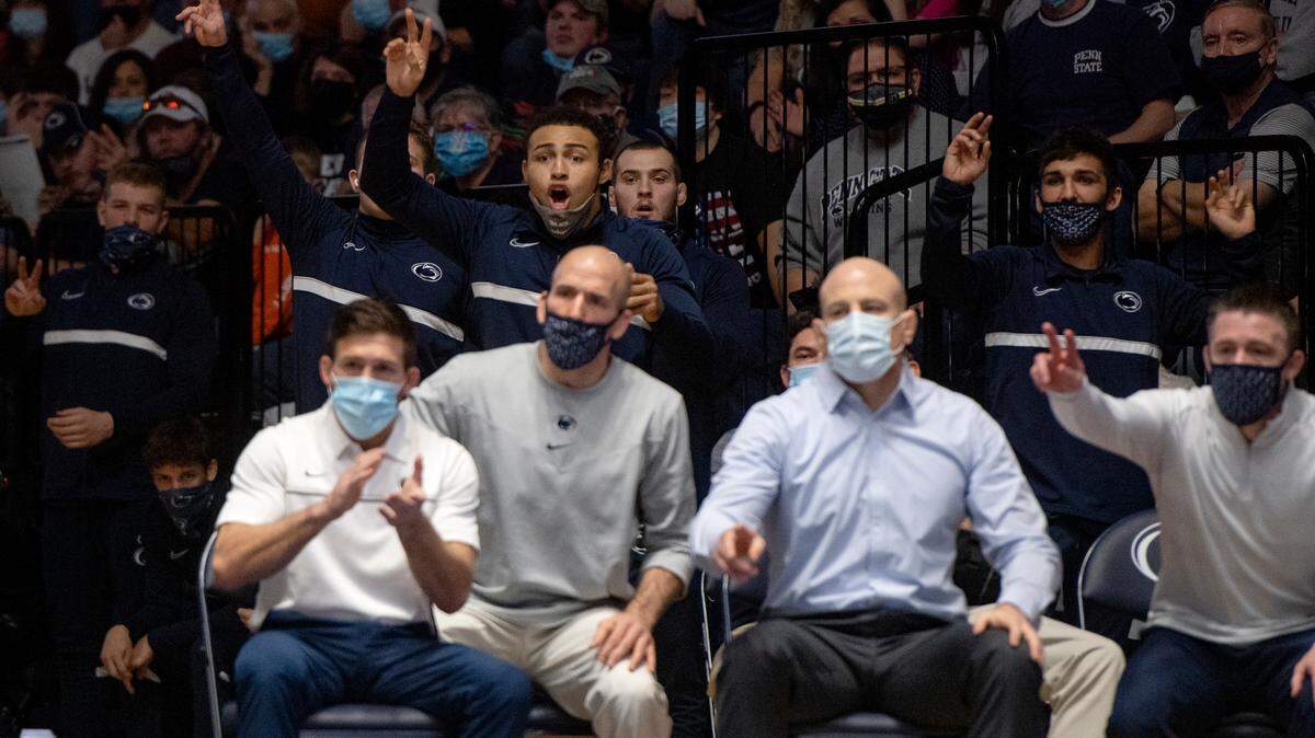 Penn StateÕs Aaron Brooks cheers for his teammate Tony Negron in the 157 lb bout during the match on Sunday, Dec. 5, 2021 at Rec Hall. Penn State won, 23-16.