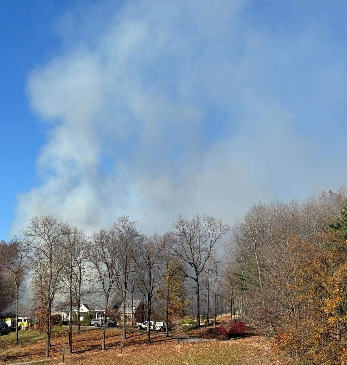 Crews were forced to battle a blaze in the 100 block of Chapelwood Lane in Walker Township on Friday afternoon, as a building was on fire and a wildfire was also in the vicinity.