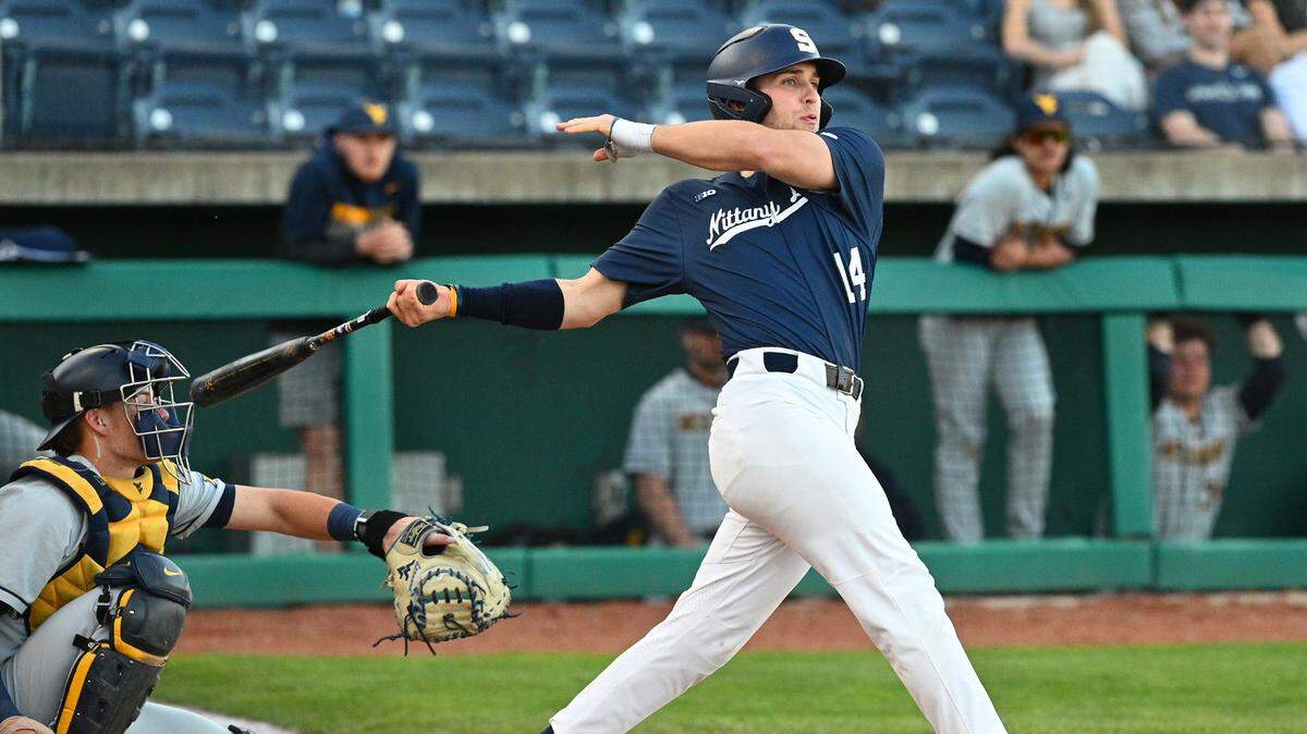 Penn State’s Matt Wood (14) hits a double against West Virginia on April 12.