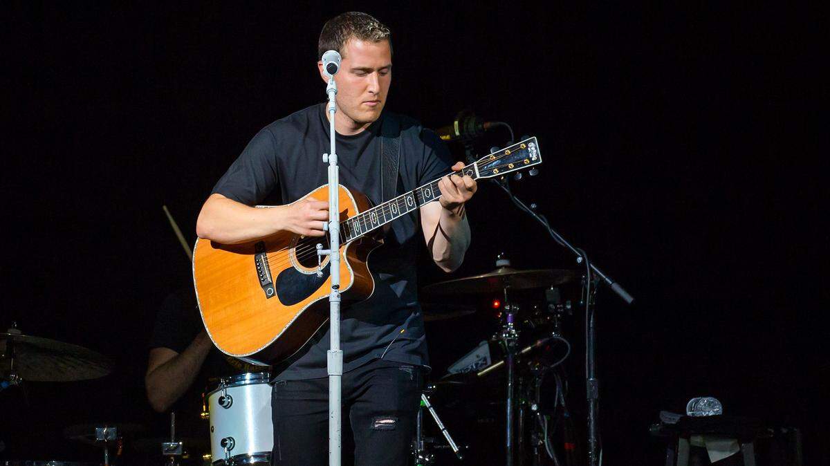 Mike Posner performs on Sept. 10, 2016 during the Future Now Tour at the AT&T Center in San Antonio, Texas. The singer is planning a walk across the country, with a stop in State College.