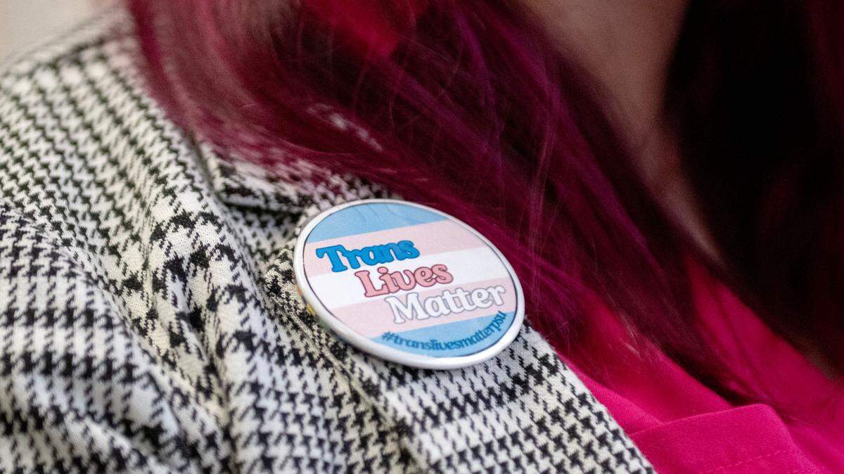Michel Lee Garrett wears a “Trans Lives Matter” pin on Thursday, Feb. 20, 2025.