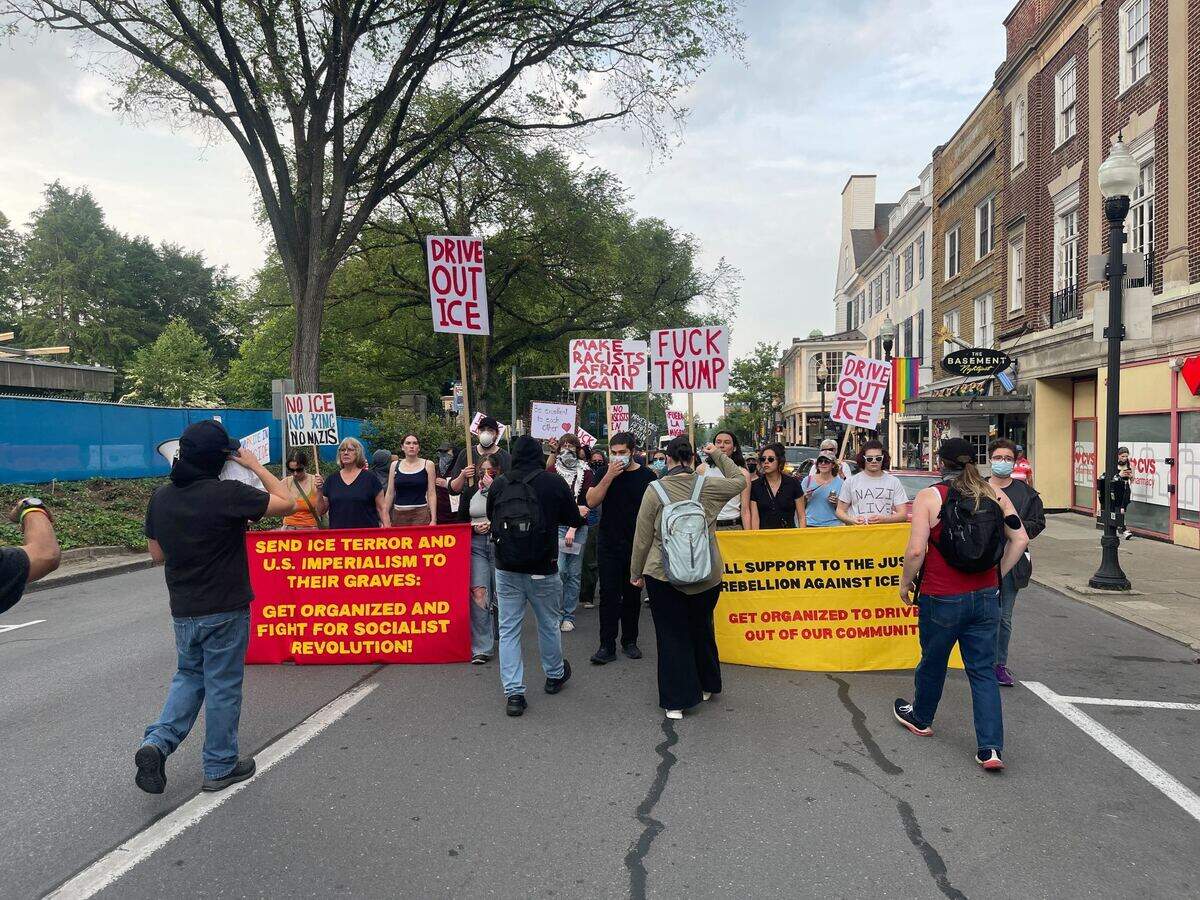 Anti-ICE protesters march down College Avenue in downtown State College on Thursday, June 12, 2025.