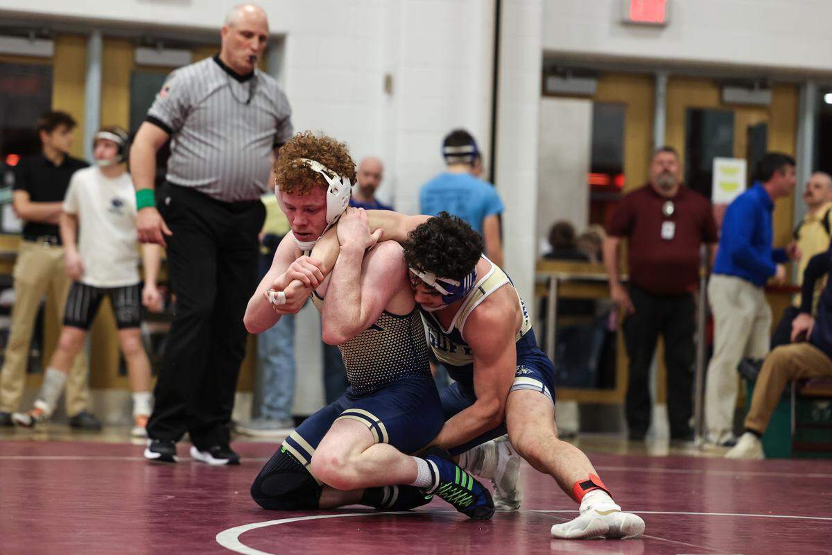 Bald Eagle Area’s Dawson Lomison battles with McGuffey’s Victor Bonus in their 152-pounds quarterfinals match of the PIAA Class 2A Southwest Regional Championships on Friday, Feb. 27, 2026 in Altoona. Lomison beat Bonus, 7-3.