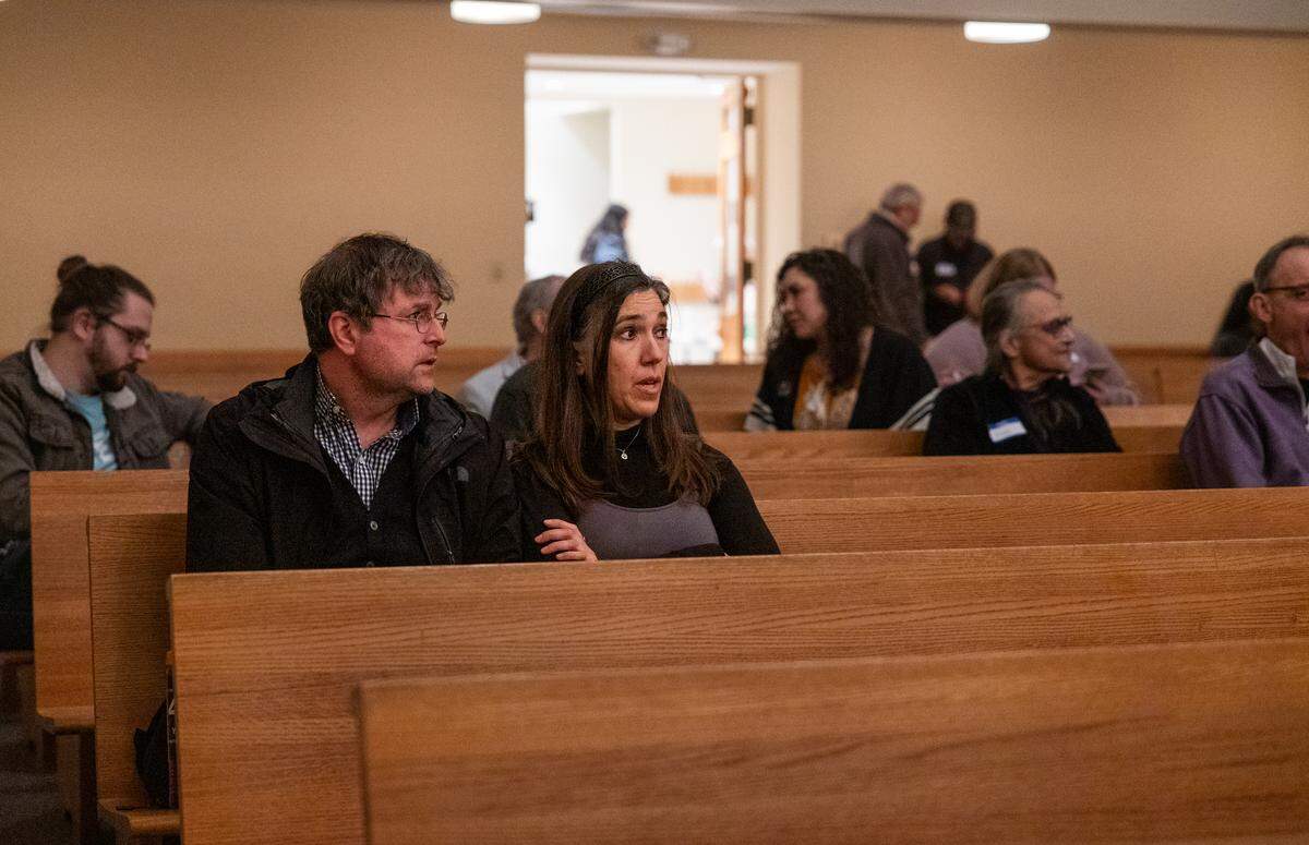 Josh Wretzel, left, and Fishley Hamlin, right, of State College prepare to watch an episode of “It Couldn’t Happen Here” at University Baptist and Brethren Church in State College, Pa., on Friday, Feb. 27, 2026. The episode features Subramanyam “Subu” Vedam, a State College man who spent more than four decades in prison before his murder conviction was vacated.