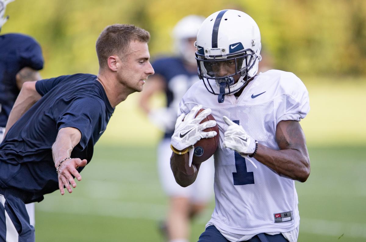Penn State wide receiver KJ Hamler makes a catch and runs towards the end zone during practice on Wednesday, Aug. 29, 2018.