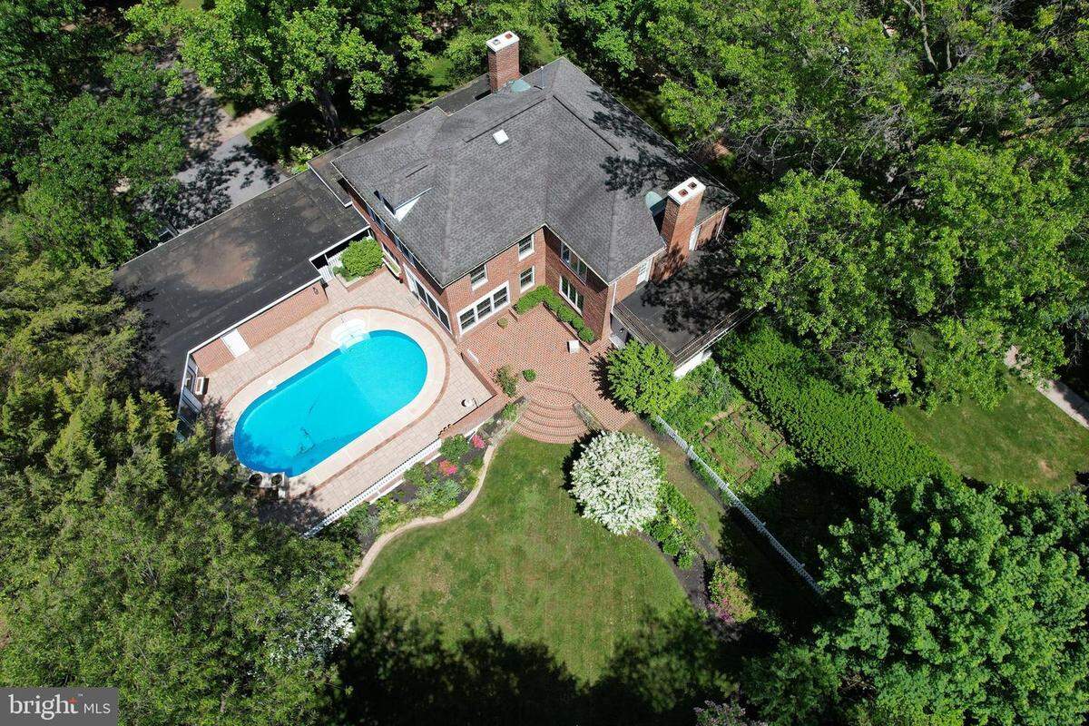 An aerial view of the home and pool for sale at 505 Hillcrest Ave. in State College.