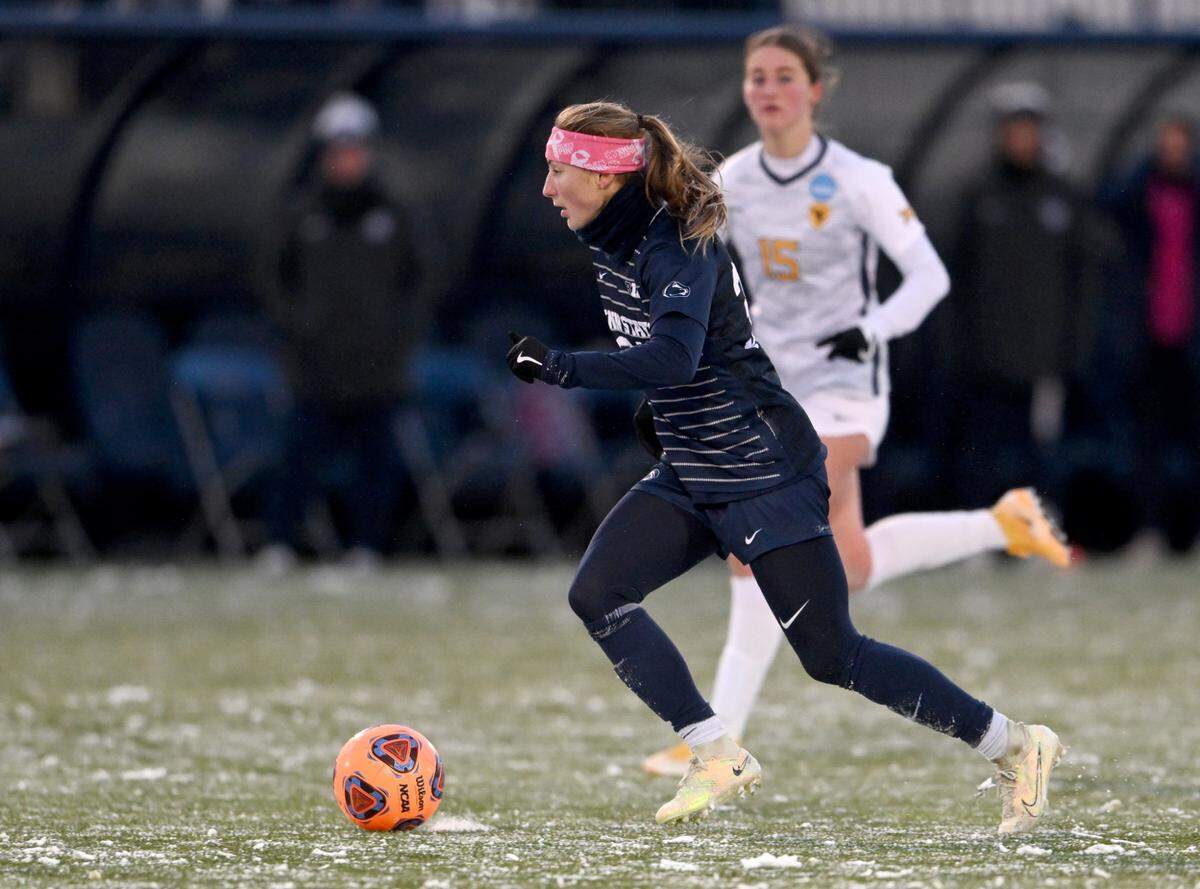 Penn State women’s soccer’s Ally Schlegel runs down the field with the ball during the game against West Virginia in the second round of the NCAA championships on Friday, Nov. 18, 2022, at Jeffrey Field.