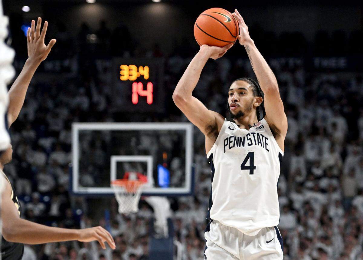 Penn State’s Freddie Dilione V shoots for a basket over Purdue defenders during the game on Thursday, Dec. 5, 2024.