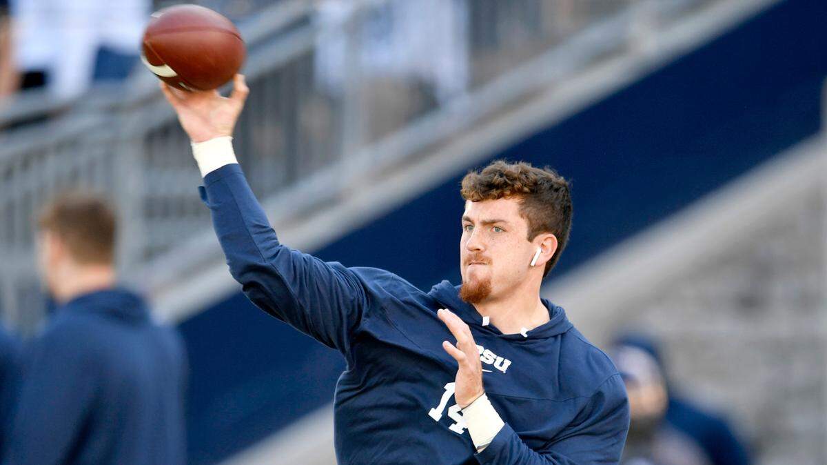 Penn State quarterback Sean Clifford warms up for the game against Villanova on Saturday, Sept. 25, 2021 at Beaver Stadium.