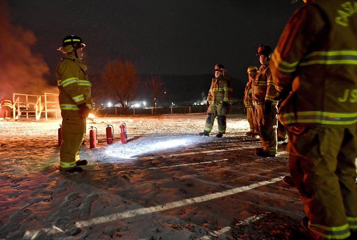 Fire instructor Tim Archer talks to his class as they learn about fire extinguishers at the Centre County Public Safety Training Center in Pleasant Gap on Jan. 17.
