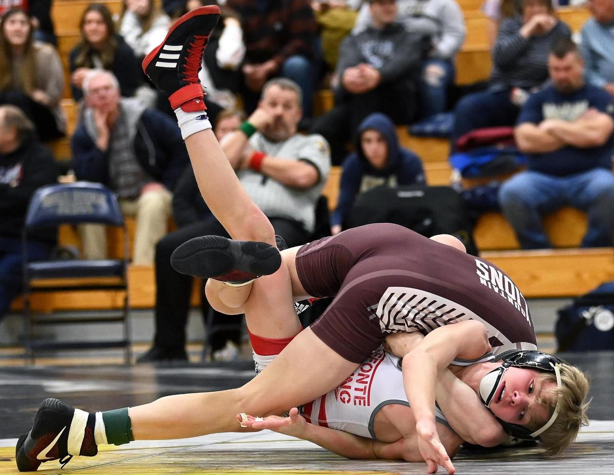 Bellefonte’s Wyatt Long fights off being pinned by Altoona’s Braiden Weaver in their 107-pound final of the Big 7 Tournament on Saturday, January 21, 2023. Weaver did end up pinning Long in 4:57.