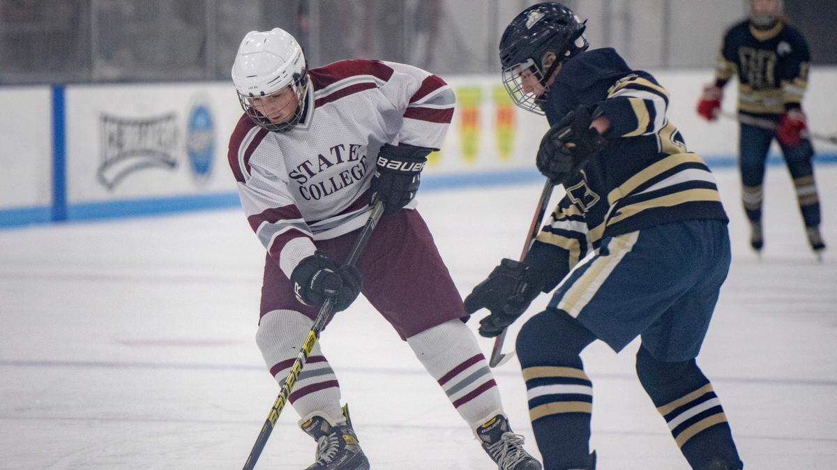 State College’s Ben Lee cuts around a Hollidaysburg defender during a game on Jan. 27.