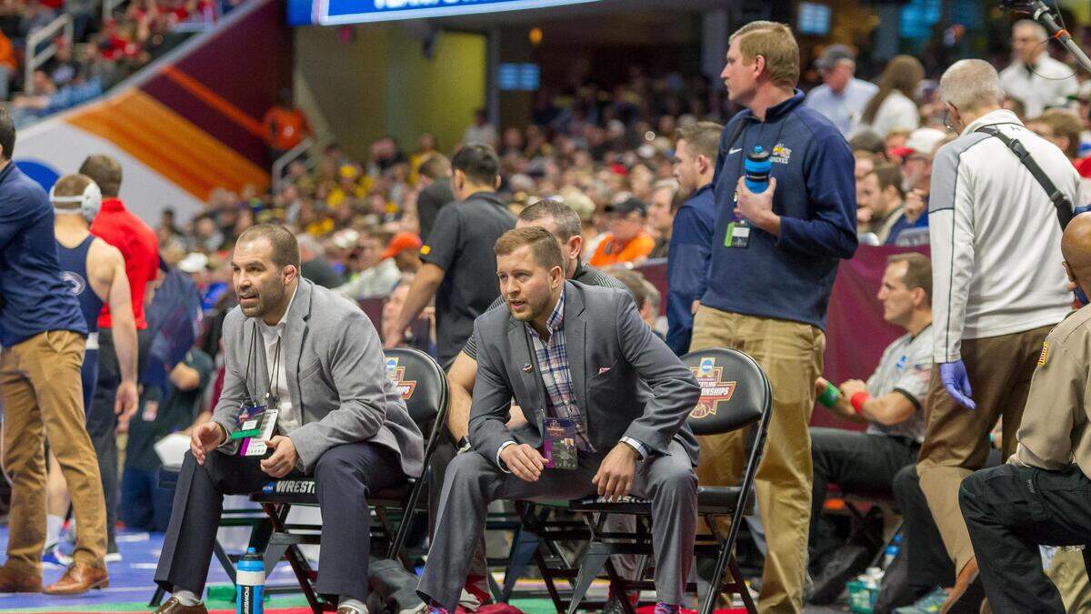 Scott Moore, right, wrestled for Penn State collegiately. Moore is now leading a very successful Lock Haven program and former Centre County wrestlers in Brock Port from Bellefonte, Garrett Rigg from Bald Eagle Area and Corey Hazel from Penns Valley.