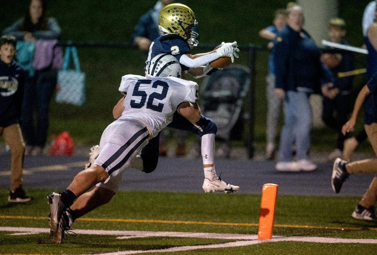Philipsburg-Osceola’s Alex Knepp can’t stop Bald Eagle Area’s Kahale Burns as he leaps into the end zone during the game on Friday, Sept. 22, 2023.